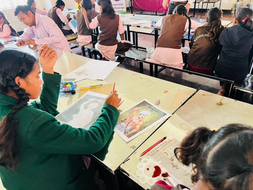 Students painting and sketching during an art class at school