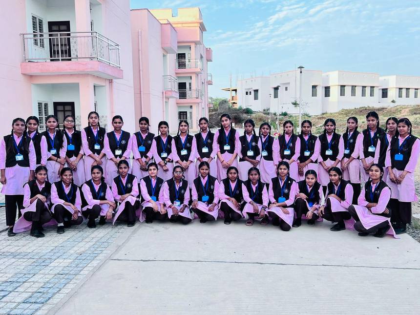 Students of EMRS Parda Chundawat in front of the campus residential blocks